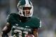 EAST LANSING, MI - NOVEMBER 02: Darqueze Dennard #31 of the Michigan State Spartans celebrates his fourth-quarter interception against the Michigan Wolverines at Spartan Stadium on November 2, 2013 in East Lansing, Michigan. Michigan State won the game 29-6. (Photo by Gregory Shamus/Getty Images)