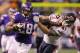 MINNEAPOLIS, MN - DECEMBER 1: Adrian Peterson #28 of the Minnesota Vikings carries the ball for ten thousand career rushing yards against Chris Conte #47 of the Chicago Bears on December 1, 2013 at Mall of America Field at the Hubert Humphrey Metrodome in Minneapolis, Minnesota. (Photo by Adam Bettcher/Getty Images)