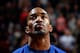 SACRAMENTO, CA - MARCH 26: J.R. Smith #8 of the New York Knicks stands for the National Anthem before their game against the Sacramento Kings at Sleep Train Arena on March 26, 2014 in Sacramento, California. NOTE TO USER: User expressly acknowledges and agrees that, by downloading and or using this photograph, User is consenting to the terms and conditions of the Getty Images License Agreement. (Photo by Ezra Shaw/Getty Images)
