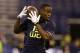Oregon State wide receiver Brandin Cooks makes a catch during a drill at the NFL football scouting combine in Indianapolis, Sunday, Feb. 23, 2014. (AP Photo/Michael Conroy)