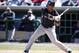 New York Yankees Yangervis Solarte bats in a spring exhibition baseball game against the Philadelphia Phillies in Clearwater, Fla., Thursday, March 13, 2014. (AP Photo/Kathy Willens)