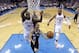 San Antonio Spurs guard Tony Parker (9) goes up for a shot in front of Oklahoma City Thunder forward Serge Ibaka (9) and guard Russell Westbrook (0) during the second quarter of an NBA basketball game in Oklahoma City, Thursday, April 3, 2014. Oklahoma City won 106-94. (AP Photo/Sue Ogrocki)