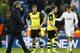 Dortmund head coach Juergen Klopp, left, leaves the pitch after the Champions League quarterfinal first leg soccer match between Real Madrid and Borussia Dortmund at the Santiago Bernabeu stadium in Madrid, Spain, Wednesday, April 2, 2014. (AP Photo/Andres Kudacki)