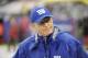New York Giants head coach Tom Coughlin walks on the field before an NFL football game against the Washington Redskins Sunday, Dec. 29, 2013, in East Rutherford, N.J. (AP Photo/Bill Kostroun)