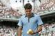 Switzerland's Roger Federer prepares to serve to France's Gael Monfils during a quarterfinal match of the French Open tennis tournament at the Roland Garros stadium in Paris, Wednesday June 3, 2009. (AP Photo/Lionel Cironneau)