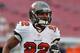 TAMPA, FL - AUGUST 29: Running back Doug Martin #22 of the Tampa Bay Buccaneers warms up for play against the Washington Redskins August 29, 2013 at Raymond James Stadium in Tampa, Florida. (Photo by Al Messerschmidt/Getty Images)