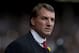 Liverpool's manager Brendan Rodgers takes to the touchline before his team's English Premier League soccer match against Tottenham at Anfield Stadium, Liverpool, England, Sunday March 30, 2014. (AP Photo/Jon Super)