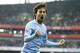 Manchester City's David Silva celebrates scoring a goal during the English Premier League soccer match between Arsenal and Manchester City at the Emirates stadium in London, Saturday, March 29, 2014. (AP Photo/Kirsty Wigglesworth)