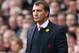 LIVERPOOL, ENGLAND - MARCH 30: Liverpool Manager Brendan Rodgers takes notes during the Barclays Premier League match between Liverpool and Tottenham Hotspur at Anfield on March 30, 2014 in Liverpool, England. (Photo by Alex Livesey/Getty Images)
