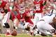 Oklahoma's Gabe Ikard, center, prepares to hike the ball during he first half of an NCAA college football game against TCU on Saturday, Oct. 5, 2013, in Norman, Okla. (AP Photo/Alonzo Adams)