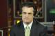In this Tuesday, April 7, 2009 photo, football draft analyst Mel Kiper Jr. pauses while taping at the ESPN Zone, in Baltimore. Saturday marks the 25th anniversary of Kiper's 1984 debut on ESPN's draft coverage, and while his demeanor and hair haven't changed all that much, his popularity certainly has. (AP Photo/Gail Burton)