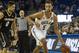 UCLA guard Kyle Anderson, right, plays against Colorado guard Askia Booker during an NCAA college basketball game at UCLA's Pauley Pavilion, Thursday, Feb. 13, 2014 in Los Angeles. (AP Photo/Ringo H.W. Chiu)