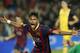Barcelona's Neymar celebrates after scoring his sides first goal during a first leg quarterfinal Champions League soccer match between Barcelona and Atletico Madrid at the Camp Nou stadium in Barcelona, Spain, Tuesday April 1, 2014. (AP Photo/Emilio Morenatti)