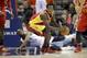 Houston Rockets' Patrick Beverley (2) grabs a loose ball away from Charlotte Bobcats' Kemba Walker (15) during the second half of an NBA basketball game in Charlotte, N.C., Monday, March 24, 2014. The Rockets won 100-89. (AP Photo/Bob Leverone)