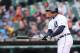 DETROIT, MI - APRIL 04: Miguel Cabrera #24 of the Detroit Tigers singles to left center field, scoring Ian Kinsler (not pictured) during the sixth inning of the game against the Baltimore Orioles at Comerica Park on April 4, 2014 in Detroit, Michigan. The Tigers defeated the Orioles 10-4. (Photo by Leon Halip/Getty Images)