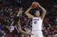 Connecticut's Kiah Stokes (41) is defended by Texas A&M's Achiri Ade (35) during the first half of a regional final game in the NCAA college basketball tournament in Lincoln, Neb., Monday, March 31, 2014. (AP Photo/Nati Harnik)