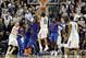 Connecticut's Shabazz Napier (13) goes up for the game winning basket at the buzzer during the second half of an NCAA college basketball game against Florida, Monday, Dec. 2, 2013, in Storrs, Conn. Connecticut won 65-64. (AP Photo/Jessica Hill)
