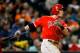 HOUSTON, TX - APRIL 04: Josh Hamilton #32 of the Los Angeles Angels of Anaheim drives the ball to right field for a three run home run in the sixth inning against the Houston Astros at Minute Maid Park on April 4, 2014 in Houston, Texas. (Photo by Bob Levey/Getty Images)