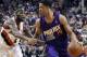 Phoenix Suns forward Gerald Green, right, dribbles against Portland Trail Blazers guard Will Barton during the first half of an NBA basketball game in Portland, Ore., Friday, April 4, 2014. (AP Photo/Don Ryan)