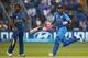 CARDIFF, WALES - JUNE 20: Virat Kohli (R) of India takes another run as Lasith Malinga (L) of Sri Lanka looks on during the ICC Champions Trophy Semi-Final match between India and Sri Lanka at the SWALEC Stadium on June 20, 2013 in Cardiff, Wales. (Photo by Michael Steele/Getty Images)