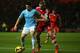SOUTHAMPTON, ENGLAND - DECEMBER 07: Samir Nasri of Manchester City holds back Luke Shaw of Southampton during the Barclays Premier League match between Southampton and Manchester City at St Marys Stadium on December 07, 2013 in Southampton, England. (Photo by Bryn Lennon/Getty Images)