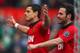 MANCHESTER, ENGLAND - MARCH 29: Javier Hernandez of Manchester United celebrates scoring his team's fourth goal with Juan Mata (R) during the Barclays Premier League match between Manchester United and Aston Villa at Old Trafford on March 29, 2014 in Manchester, England. (Photo by Alex Livesey/Getty Images)