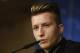 Dortmund's Marco Reus speaks during a press conference at the Santiago Bernabeu stadium in Madrid, Spain, Tuesday, April 1, 2014. Borussia Dortmund will face Real Madrid in a first leg quarterfinal Champions League soccer match April 2. (AP Photo/Andres Kudacki)
