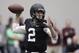 Texas A&M quarterback Johnny Manziel passes the ball during a drill at pro day for NFL football representatives in College Station, Texas, Thursday, March 27, 2014. (AP Photo/Patric Schneider)