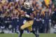 SOUTH BEND, IN - NOVEMBER 17: Everett Golson #5 of the Notre Dame Fighting Irish rolls out against the Wake Forest Demon Deacons at Notre Dame Stadium on November 17, 2012 in South Bend, Indiana. Notre Dame defeated Wake Forest 38-0. (Photo by Jonathan Daniel/Getty Images)