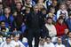 Chelsea's manager Jose Mourinho watches his team play against Stoke City during their English Premier League soccer match at Stamford Bridge, London, Saturday, April 5, 2014. (AP Photo/Sang Tan)