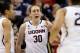 FILE - In this March 10, 2014, file photo, Connecticut's Breanna Stewart (30) calls out to teammate Kaleena Mosqueda-Lewis, right, as Kia Stokes, left, stands near after Stewart was fouled during the first half of an NCAA college basketball game in the finals of the American Athletic Conference women's basketball tournament in Uncasville, Conn. Stewart earned The Associated Press Player of the Year award Saturday, April 5, 2014, becoming just the third sophomore to achieve the honor. (AP Photo/Jessica Hill, File)