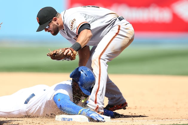 Yasiel Puig Injured His Thumb Diving Head-First into First Base