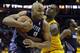 Cleveland Cavaliers' Dion Waiters, right, fouls Charlotte Bobcats' Gerald Henderson in overtime of an NBA basketball game Saturday, April 5, 2014, in Cleveland. (AP Photo/Mark Duncan)