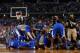 ARLINGTON, TX - APRIL 05: The Kentucky Wildcats celebrate after defeating the Wisconsin Badgers 74-73 in the NCAA Men's Final Four Semifinal at AT&T Stadium on April 5, 2014 in Arlington, Texas. (Photo by Tom Pennington/Getty Images)