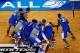 ARLINGTON, TX - APRIL 05: The Kentucky Wildcats celebrate after defeating the Wisconsin Badgers 74-73 in the NCAA Men's Final Four Semifinal at AT&T Stadium on April 5, 2014 in Arlington, Texas. (Photo by Ronald Martinez/Getty Images)