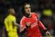 Benfica's Lazar Markovic, from Serbia, reacts as he celebrates after scoring his side's second goal against Pacos Ferreira in a Portuguese League soccer match at Mata Real stadium in Pacos de Ferreira, northern Portugal, Sunday, Feb. 16, 2014. (AP Photo/Paulo Duarte)