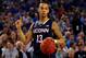ARLINGTON, TX - APRIL 05: Shabazz Napier #13 of the Connecticut Huskies reacts during the NCAA Men's Final Four Semifinal against the Florida Gators at AT&T Stadium on April 5, 2014 in Arlington, Texas. The Connecticut Huskies defeated the Florida Gators 63-53. (Photo by Ronald Martinez/Getty Images)