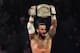 In this Dec. 11, 2011 photo released by the WWE, WWE Champion CM Punk performs during WWE’s 9th annual