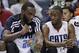 Charlotte Bobcats' Al Jefferson, left, and Kemba Walker, right, celebrate on the bench during the second half of an NBA basketball game against the New York Knicks in Charlotte, N.C., Tuesday, Jan. 14, 2014. The Bobcats won 108-98. (AP Photo/Chuck Burton)