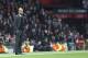 Bayern head coach Pep Guardiola watches the Champions League quarterfinal first leg soccer match between Manchester United and Bayern Munich at Old Trafford Stadium, Manchester, England, Tuesday, April 1, 2014.(AP Photo/Jon Super)