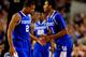 ARLINGTON, TX - APRIL 05: James Young #1 celebrates with Aaron Harrison #2 of the Kentucky Wildcats during the NCAA Men's Final Four Semifinal against the Wisconsin Badgers at AT&T Stadium on April 5, 2014 in Arlington, Texas. (Photo by Jamie Squire/Getty Images)