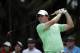 Rory McIlroy of Northern Ireland tees off on the fourth hole during the final round of the Cadillac Championship golf tournament Sunday, March 9, 2014, in Doral, Fla. (AP Photo/Lynne Sladky)