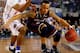 ARLINGTON, TX - APRIL 05: Shabazz Napier #13 of the Connecticut Huskies drives to the basket as Kasey Hill #0 of the Florida Gators during the NCAA Men's Final Four Semifinal at AT&T Stadium on April 5, 2014 in Arlington, Texas. (Photo by Ronald Martinez/Getty Images)