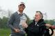 HUMBLE, TX - APRIL 06: (L-R) Matt Jones of Australia and Former U.S. President George H. W. Bush poses with the trophy after defeating Matt Kuchar of the United States in the first hole of the playoff in the final round of the Shell Houston Open at the Golf Club of Houston on April 6, 2014 in Humble, Texas. (Photo by Scott Halleran/Getty Images)