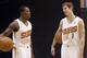 Phoenix Suns teammates Goran Dragic (1), of Slovenia, and Eric Bledsoe talk during the team's NBA basketball media day on Monday, Sept. 30, 2013, in Phoenix. (AP Photo/Ross D. Franklin)