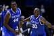 ST LOUIS, MO - MARCH 23: Julius Randle #30 of the Kentucky Wildcats celebrates with teammate Dakari Johnson #44 after defeating the Wichita State Shockers 78 to 76 during the third round of the 2014 NCAA Men's Basketball Tournament at Scottrade Center on March 23, 2014 in St Louis, Missouri. (Photo by Andy Lyons/Getty Images)