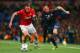 MANCHESTER, ENGLAND - APRIL 01: Phil Jones of Manchester United and Franck Ribery of Bayern Muenchen compete for the ball during the UEFA Champions League Quarter Final first leg match between Manchester United and FC Bayern Muenchen at Old Trafford on April 1, 2014 in Manchester, England. (Photo by Alex Livesey/Getty Images)