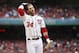 Washington Nationals left fielder Bryce Harper (34) adjusts his helmet during the baseball home opener against the Atlanta Braves at Nationals Park Friday, April 4, 2014, in Washington. The Braves defeated the Nationals 2-1. (AP Photo/Alex Brandon)