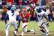 DeRon Furr (14) chases an opponent in 2009.