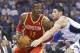 Houston Rockets' Dwight Howard (12) looks for a way around Orlando Magic's Nikola Vucevic during the first half of an NBA basketball game in Orlando, Fla., Wednesday, March 5, 2014. (AP Photo/John Raoux)